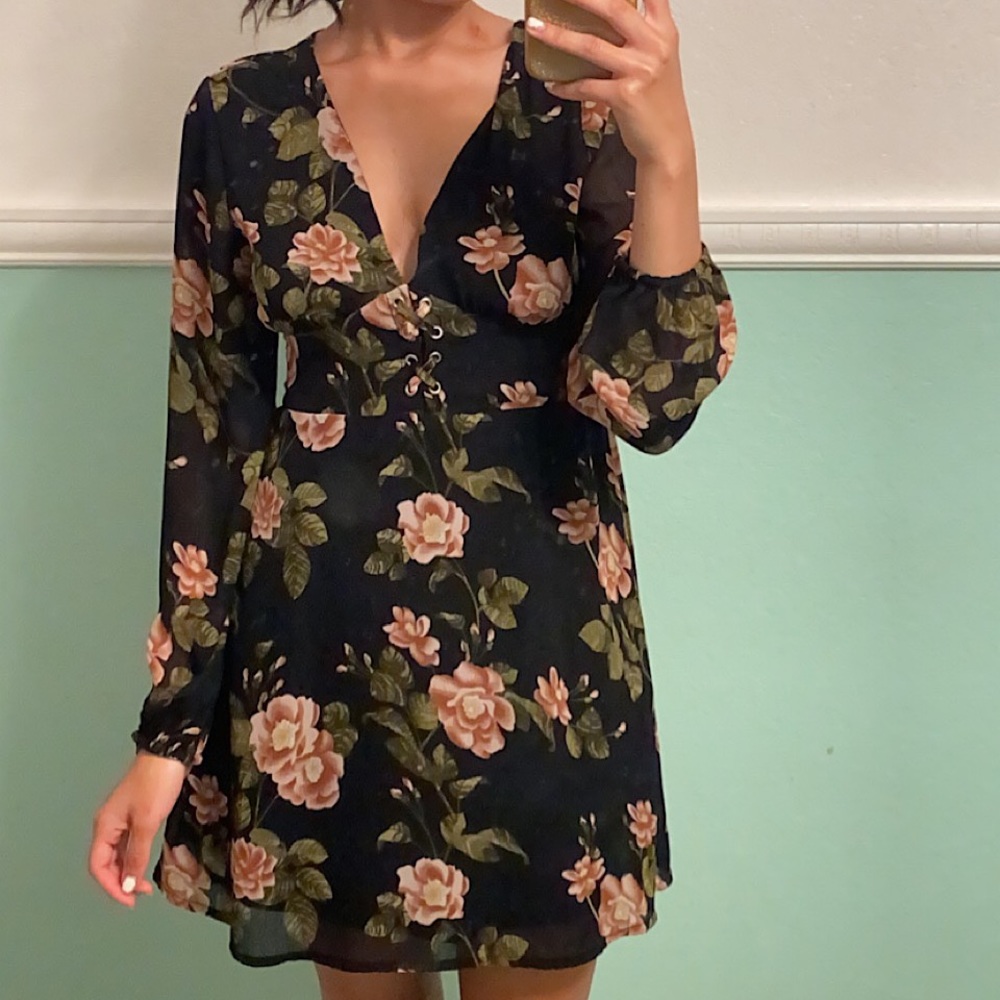 Floral black dress, some cleavage exposure